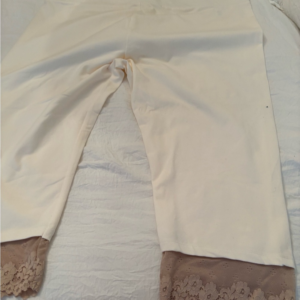 New ivory logo leggins w taupe lace trim.